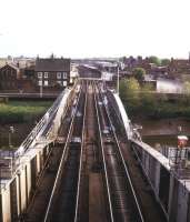 For many years Selby swing bridge was a major bottleneck on the ECML, until finally bypassed in 1983. View north across the River Ouse over Selby station in 1987 from the control cabin mounted above the centre of the bridge.<br><br>[Ian Dinmore //1987]