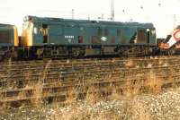 Stored locomotive line at Kingmoor on 20 February 1982 with 25082 awaiting its fate. On a happier note, the locomotive to its immediate left, 40122, was to be removed to subsequently metamorphose into the celebrity D200.<br><br>[Colin Alexander 20/02/1982]