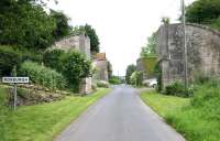 The four sentinels standing guard at the western entrance to Roxburgh in June 2005. These old abutments once carried rail routes south and east out of Roxburgh station (top left behind trees) on to Jedburgh (nearest) and Tweedmouth. <br><br>[John Furnevel 20/06/2005]