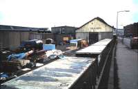 The old station at Leith North (CR) in March 1985. The skip is end-on to the platform.<br><br>[David Panton /03/1985]