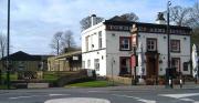 The former passenger terminus of the Preston and Longridge Railway, looking back towards Preston, with Longridge station building located behind the Towneley Arms Hotel and the Town War Memorial now standing on the former trackbed. A level crossing was also located here carrying a mineral line beyond the station and on to Tootle Heights Quarry. On the far side of the station building a block of flats has now been built across the trackbed. Photographed on 18 March 2008.<br><br>[John McIntyre 18/03/2008]