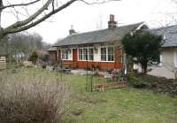 The former 1855 station at Eddleston on 26 March 2008, seen platform side looking northeast towards Leadburn. The property, which has been extended since line closure in 1962, is currently (2008) on the market advertised at offers over £385,000.<br><br>[John Furnevel 26/03/2008]