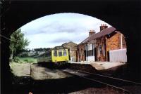 Class 107 DMU at Kilmacolm on 28th July 1975 waiting to depart with a Glasgow service.<br><br>[Graham Morgan Collection 28/07/1975]