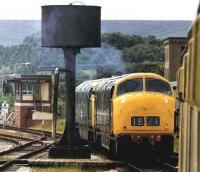 The 2 surviving members of class 42, Warships D821 <I>Greyhound</I> (nearest the camera, masquerading on this occasion as D810) and D832 <I>Onslaught</I> photographed circa 1997 running round their train at Rawtenstall.<br><br>[Colin Alexander //1997]