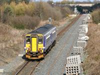 First ScotRail 156 477 with the 15.48 Glasgow Central - Newcastle Central approaching Gretna Green on 4 April 2008. The train is running alongside the newly laid down line. The current single line becomes double just beyond the platform.<br><br>[John Furnevel 04/04/2008]