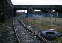 The only wheeled traffic to be seen on the line through the site of Alloa station in March 1988. The next train is a mere 20 years away! <br><br>[Mark Dufton /03/1988]