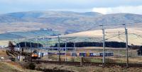 Working hard on the climb up to the site of Scout Green station (behind camera) from Tebay. Weather Hill and Tebay Fell provide a backdrop.<br><br>[Ewan Crawford 09/04/2008]