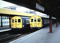 Class 302 slamdoor stock at London Fenchurch Street in July 1987 in Network SouthEast markings.<br><br>[David Panton /07/1987]