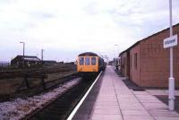 The Carlisle platform at Whitehaven (formerly Bransty) in July 1988 with new waiting room and ticket office on the right. The through platform for Barrow stands on the other side of the building.<br><br>[Ian Dinmore /07/1988]