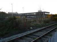 The nearest you can (legally) get to the site of Kittybrewster station. In the foreground is the increasingly well-used Waterloo branch. The remains of the down platform of Kittybrewster [2nd] station can be seen just beyond, delineated by the weather-beaten row of posts. It was very close to this location that the footbridge was sited.<br><br>[John Williamson 17/04/2008]