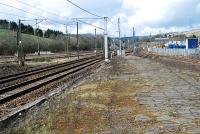 Looking north at Beattock. The cut back former southbound platform is to left and the Moffat branch bay platform to right. The platform here is now fenced off and inaccessible.<br><br>[Ewan Crawford 30/03/2008]