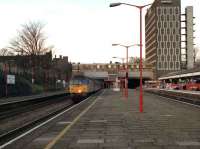 A class 47 brings a Paddington bound express through Ealing Broadway at speed in January 1990.<br><br>[John McIntyre 25/01/1990]