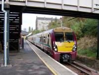 Football special comprised of a pair of 334s arrives at Mount Florida on 13 October 2007 following the six and a half minute journey from Glasgow Central. <br><br>[David Panton 13/10/2007]