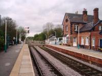 The start of the single line section from Cattal looking towards Knaresborough and Harrogate and showing the signal box, crossing and station building opened in 1848.<br><br>[Mark Bartlett 28/04/2008]