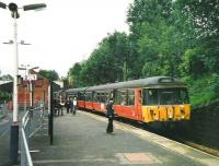 303 077 at Mount Florida in July 1999 with a direct train for Glasgow.<br><br>[David Panton /07/1999]