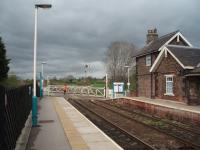 Looking along the double track section towards Cattall and Knaresborough as the signaller closes the gates to road traffic. This station opened in 1848 and still has an hourly service between York, Harrogate and Leeds.<br><br>[Mark Bartlett 28/04/2008]