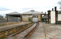 The approach to North Road station along the Stockton & Darlington route from Shildon on 4 April 2008. The remaining operational platform is on the other side of the fence on the left and is served by Bishop Auckland - Saltburn trains operated by Northern Rail. The remainder of the site is now part of the recently refurbished Darlington North Road Railway Centre and Museum.<br><br>[John Furnevel 04/04/2008]