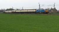 86259 in BR electric blue heads north on 3 May at Brock between Preston and Lancaster with a Birmingham - Carlisle railtour.<br><br>[John McIntyre 03/05/2008]