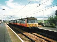 303 032 at Newton in July 1998, having reversed in readiness for the return to Glasgow Central via Maxwell Park. <br><br>[David Panton /07/1998]