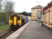 A Buxton to Blackpool North service, formed of 156426, departs from Kirkham and Wesham. View of the down slow line towards Kirkham North Junction and Blackpool. <br><br>[Mark Bartlett 26/04/2008]