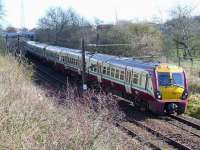 334004 at the head of a two unit set with a service for Ayr approaching Milliken Park station<br><br>[Graham Morgan 31/03/2008]