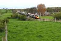 A northbound Pendolino destined for Glasgow Central approaches Oubeck Loop south of Lancaster on 3 May 2008. <br><br>[John McIntyre 03/05/2008]