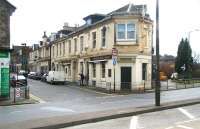 The Station Hotel, Primrose Street, Alloa, built opposite the original Alloa railway station and seen here on 27 March 2008. The design of this strangely wedge-shaped building was determined by the route of the former Alloa Wagonway, via which loaded coal wagons came in from the left along the line of the current ring road (albeit pre-dating it by 200 years) and then swung south along what is now the walkway to the right of the Hotel, heading towards the Forth. An information point commemorating the Alloa Wagonway stands below the signpost on the right of the picture.<br><br>[John Furnevel 27/03/2008]