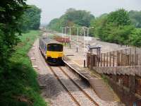 Rare occurence at the ghost station. 150146 calls at Salwick, between Preston and Kirkham, on a Colne to Blackpool South service - one of only 3 (out of 80) trains in each direction to do so. The trackbed of the former fast lines is on the far side of the station. <br><br>[Mark Bartlett 10/05/2008]