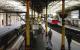 A Metropolitan Line train for Aldgate East arriving at Farringdon station platform 4 in the summer of 2005 as a southbound Thameslink service leaves platform 2 with a Bedford - Sutton working on the widened lines. Note that this photograph features at least two individuals who do not appear to be using mobile phones.<br><br>[John Furnevel 21/07/2005]