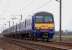 Edinburgh - North Berwick train approaching St Germains level crossing on 15 March.<br><br>[Bill Roberton 15/03/2008]