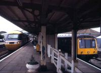 Scene at St Erth, first stop out of Penzance, in August 1992, with an InterCity 125 on a Paddington service alongside the St Ives branch train.<br><br>[Ian Dinmore 15/08/1982]