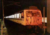 A January evening at North Berwick in 1998, with 305 517 illuminated by the glow from the buffer lights. <br><br>[David Panton /01/1998]