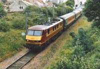 90 026 leaves North Berwick with a service for Waverley in July 2004.<br><br>[David Panton /07/2004]