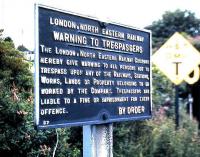 LNER trespass warning notice still standing at North Queensferry in August 1984.<br><br>[David Panton /08/1984]