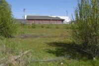 View east over the site of Dunfermline locomotive shed (62C) in May 2008. The shed, opened in 1948, officially closed in September 1969. The main line passed on the left at a higher level, while straight ahead stands the East End Park stadium of Dunfermline Athletic FC. <br><br>[Bill Roberton 16/05/2008]