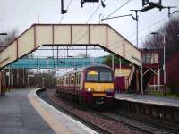 Scene at Drumry on 23 February 2008 with 320 309 on an eastbound service to Airdrie.<br><br>[David Panton 23/02/2008]