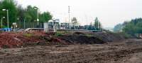 The north side of Uphall station viewed from the footpath which passes under the east end of the station and the M8. The ground is being prepared for a second platform to go with the second track.<br><br>[Ewan Crawford 10/05/2008]