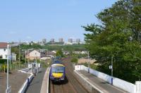 An express 170 in FSR livery races through the short platforms of Invergowrie heading for Dundee.<br><br>[Brian Forbes /05/2008]