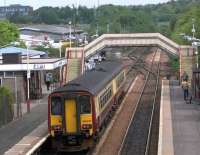 The hourly Motherwell shuttle service has arrived at Cumbernauld formed by SPT set 156435<br><br>[Brian Forbes 22/05/2008]