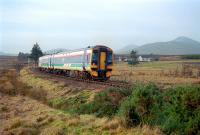 Inverness - Thurso and Wick service heading north into the moss from Forsinard in 2002.<br><br>[Ewan Crawford /02/2002]