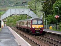 An Airdrie service at Kilpatrick on 17 May formed by 320 316.<br><br>[David Panton 17/05/2008]