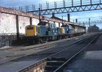 Not what I expected when bunking 9A Longsight Depot in Manchester in 1972. Claytons 8512 and 8598 were used by the Research Centre in Derby at the time and are seen in the remains of the old Longsight running shed in company with Brush 4 No. 1927<br><br>[Mark Bartlett /04/1972]