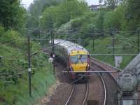 334006 passing by the junction of the southern part of the Johnstone Curve that connected the GPK&A Railway at Johnstone to the Bridge of Weir Railway at Cart Junction. The curve was originally built to allow trains to travel directly from Greenock to Ayrshire, that service ended in 1900. <br><br>[Graham Morgan 20/05/2008]