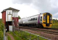 Alphaline liveried, but carrying First ScotRail branding. 158867 photographed passing Carmuirs West Junction signal box on 29 May 2008.<br><br>[Bill Roberton 29/05/2008]