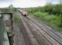 A diverted northbound Pendolino is dragged east through Horrocksford Junction towards Hellifield on 17 May by 57314 <I>Firefly</I>.<br><br>[John McIntyre 17/05/2008]