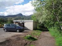 Killin  station itself is not the picturesque location it once was with a toilet block where the station building stood and a council depot in the goods yard. However, over forty years after closure in 1965, the trackbed towards Loch Tay still makes an excellent country walk. Map Ref NN 575333 [See image 23665] for a 'Then and Now' comparison with the station in operation.<br><br>[Mark Bartlett 29/05/2008]