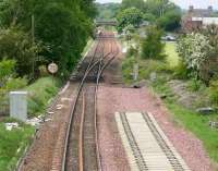 View west from Summergate Road footbridge, Annan, on 21 May 2008, showing the end of the current single line section from Gretna. The western extent of the preparatory work for the new up line can be seen running alongside and the platforms of Annan station stand just beyond the roadbridge.<br><br>[John Furnevel 21/05/2008]
