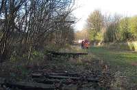 View looking west towards the level crossing. Track panels were lifted here (but not relaid) for a new sewer.<br><br>[Ewan Crawford Collection //2004]