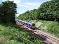 Weeton sees Transpennine units 185109 and 185111 pass the site of the now demolished signal box on 3rd June 2008 with a Blackpool North to Manchester Airport service. This location has lost its features now compared to 1981 [See image 19151]. <br><br>[Mark Bartlett 03/06/2008]