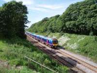 Weeton sees Transpennine units 185109 and 185111 pass the site of the now demolished signal box on 3rd June 2008 with a Blackpool North to Manchester Airport service. This location has lost its features now compared to 1981 [See image 19151]. <br><br>[Mark Bartlett 03/06/2008]